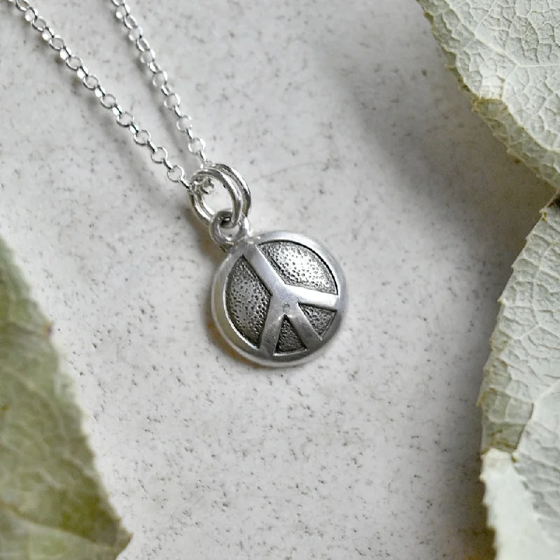 modern necklaces for women -'Peace' Tiny Die Struck Silver Necklace