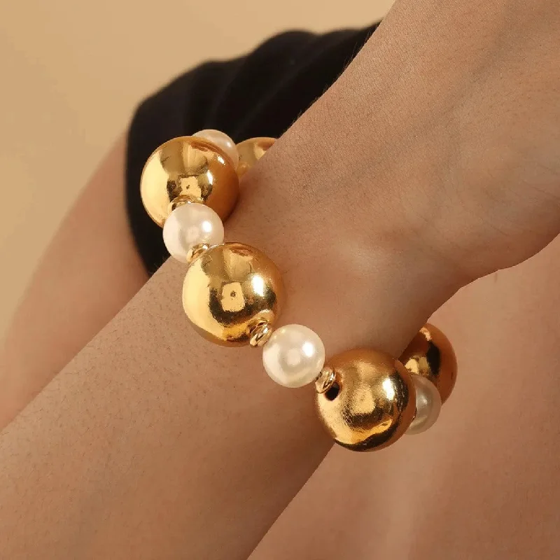 gemstone bangles for brides -TFC Bold And Gold Pearl Bead Bracelet